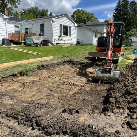 Part 1 - Shed pad installation in Kent Ohio with compacted gravel base prepared by N & J Excavating for a residential storage shed
