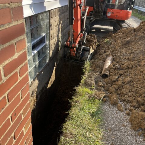 Exterior foundation waterproofing in Chesterland Ohio showing excavation and membrane installation by N & J Excavating - Part 1