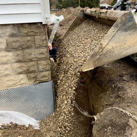 Exterior foundation waterproofing in Chesterland Ohio showing excavation and membrane installation by N & J Excavating - Part 10