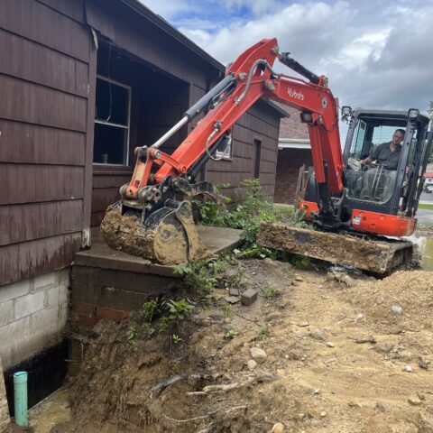 Residential demolition in Kent Ohio showing concrete stoop removal by N & J Excavating - Part 2