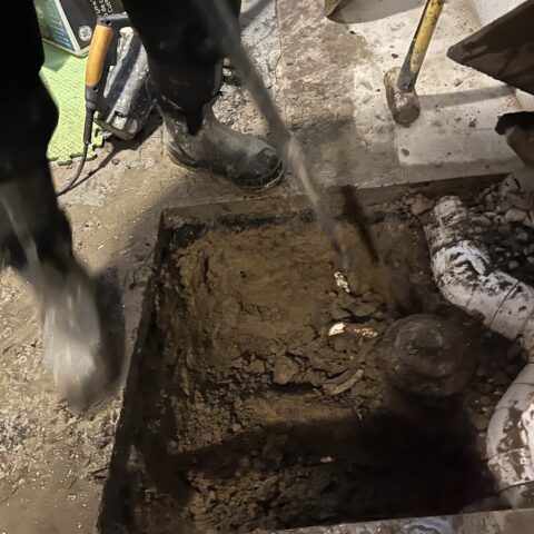Sewer lateral replacement in Cuyahoga Falls Ohio showing trench excavation and new sewer pipe installed by N & J Excavating - Part 2