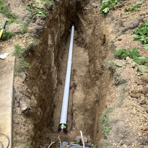 Sewer lateral replacement in Cuyahoga Falls Ohio showing trench excavation and new sewer pipe installed by N & J Excavating - Part 3