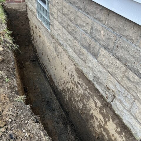 Exterior foundation waterproofing in Chesterland Ohio showing excavation and membrane installation by N & J Excavating - Part 3