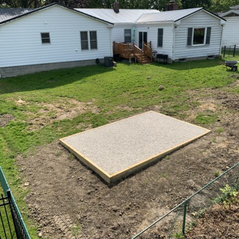 Part 4 - Shed pad installation in Kent Ohio with compacted gravel base prepared by N & J Excavating for a residential storage shed