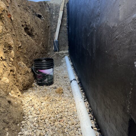Exterior foundation waterproofing in Chesterland Ohio showing excavation and membrane installation by N & J Excavating - Part 5