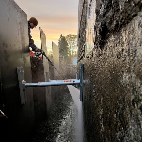 Exterior foundation waterproofing in Chesterland Ohio showing excavation and membrane installation by N & J Excavating - Part 8