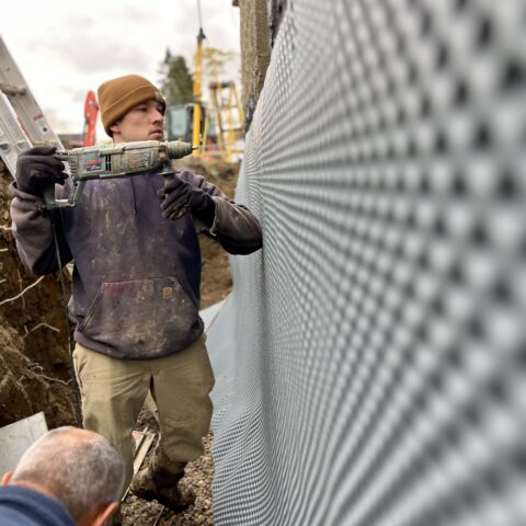 Exterior foundation waterproofing in Chesterland Ohio showing excavation and membrane installation by N & J Excavating - Part 9